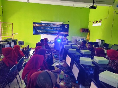 WORKSHOP LEARNING MANAGEMENT SYSTEM IMPLEMENTASI PENILAIAN BERBASIS IT 