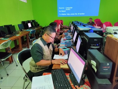 WORKSHOP LEARNING MANAGEMENT SYSTEM IMPLEMENTASI PENILAIAN BERBASIS IT 