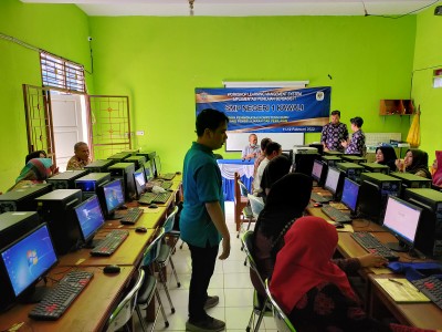 WORKSHOP LEARNING MANAGEMENT SYSTEM IMPLEMENTASI PENILAIAN BERBASIS IT 